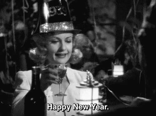 Classic-Happy-New-Years-Eve-Toast-In-Sawdust-and-Tinsel