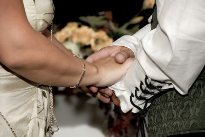 the bride and groom sharing their vows